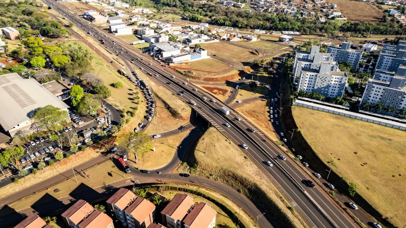 Aerial view of a busy Brazilian highway interchange, the road route between São Paulo and Rio de Janeiro.