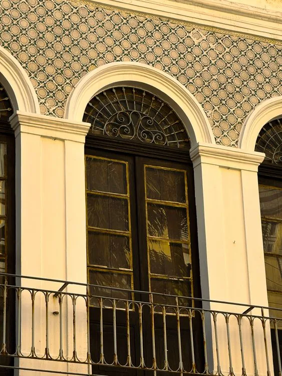 Colonial architecture in Recife, Brazil, showing arched windows and traditional Portuguese azulejo tilework — characteristic of the Recife Antigo historic district.