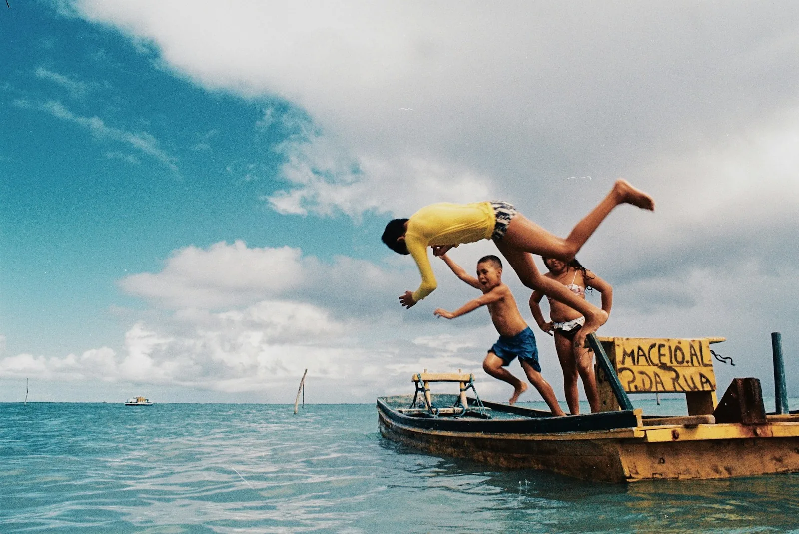 Visitors enjoying a bright day on the water in Maceió, matching the relaxed beach rhythm around Pajuçara and Ponta Verde.